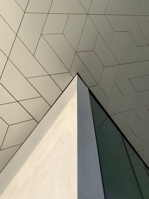 Dettaglio architettonico con triangoli isosceli e simmetria angolare, design moderno e minimalista per articolo sui triangoli.