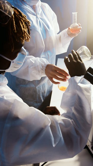 Ricerca scientifica e finanziamenti: scienziati al lavoro in laboratorio per sviluppare soluzioni innovative con prestiti rateali flessibili.