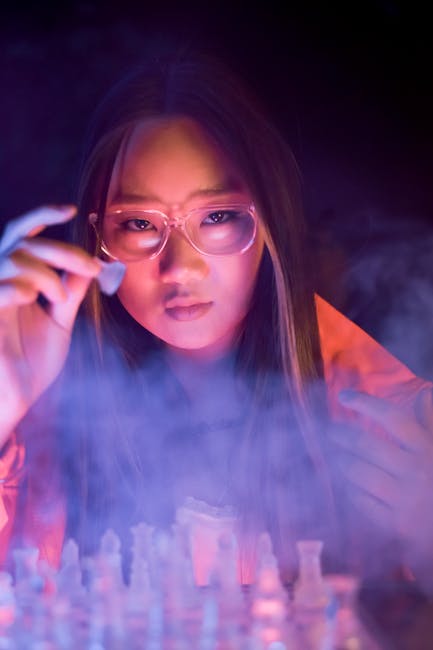 Donna asiatica con scacchi di vetro, metafora di strategia didattica innovativa e coinvolgente per studenti e docenti.